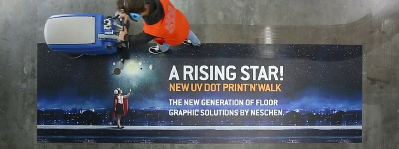 Image of indoor floor graphics being cleaned